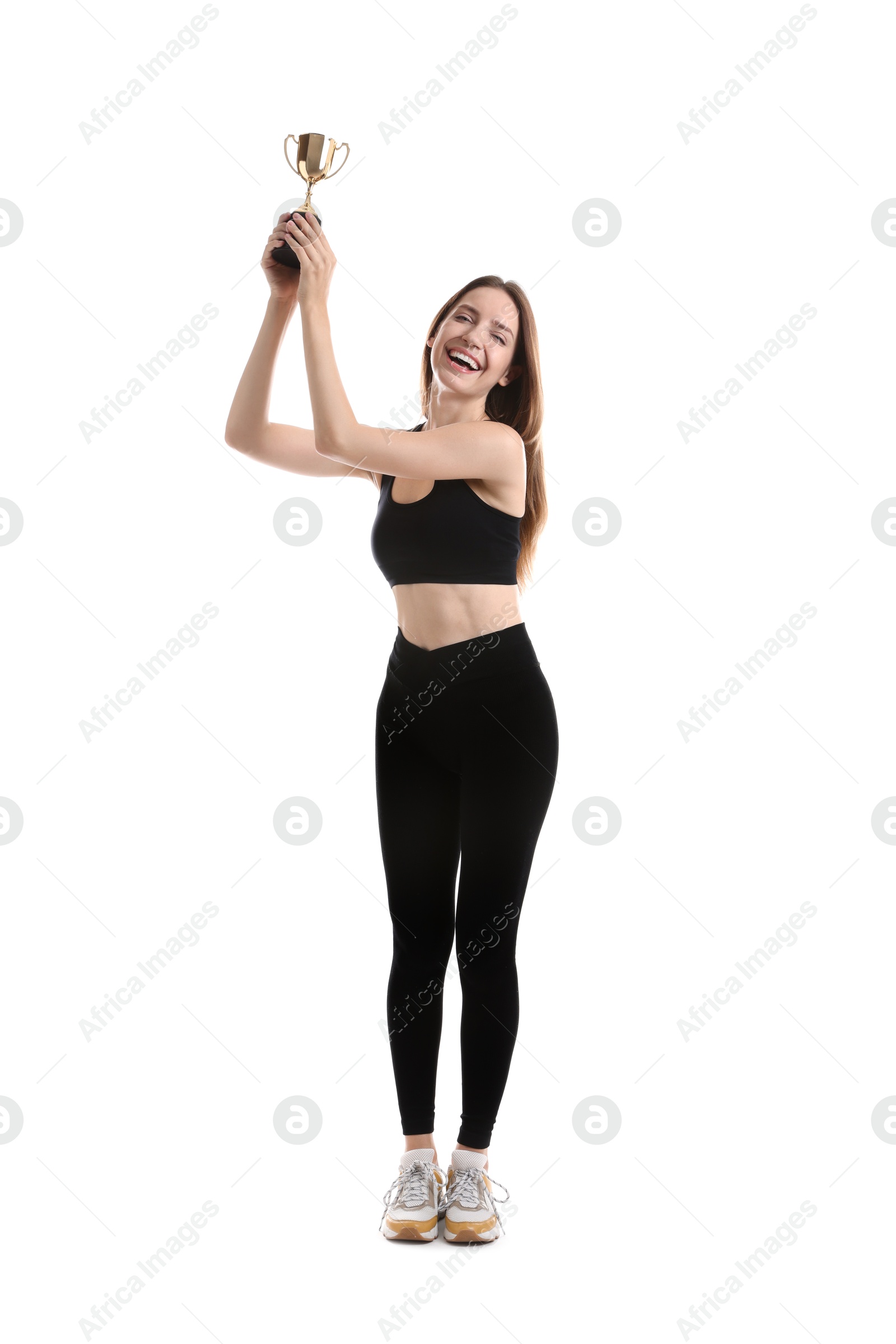 Photo of Happy winner with gold trophy cup on white background