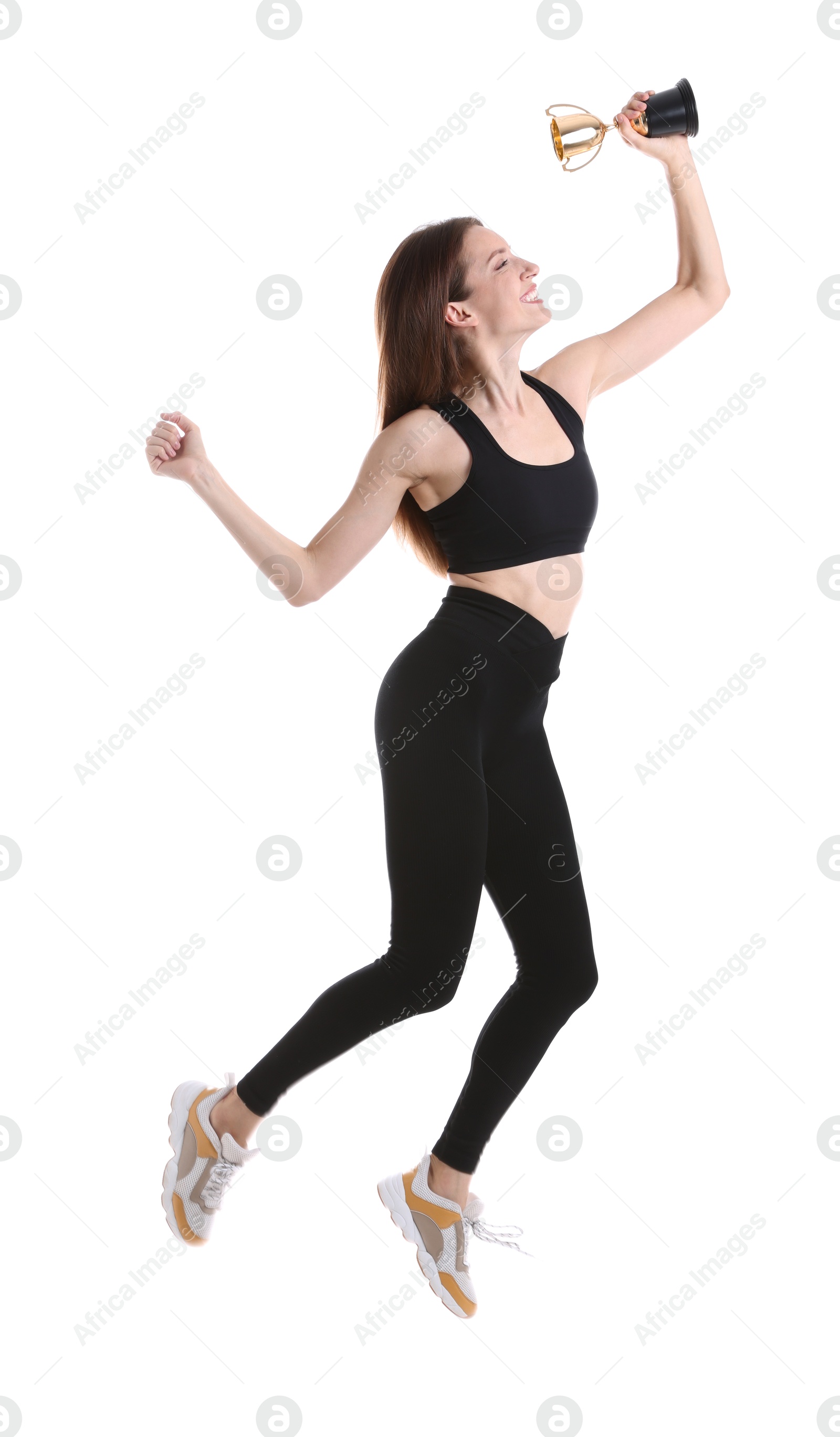 Photo of Happy winner with gold trophy cup on white background