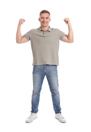 Happy winner showing his biceps on white background