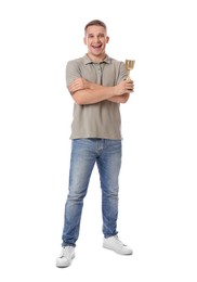 Photo of Happy winner with golden trophy cup on white background