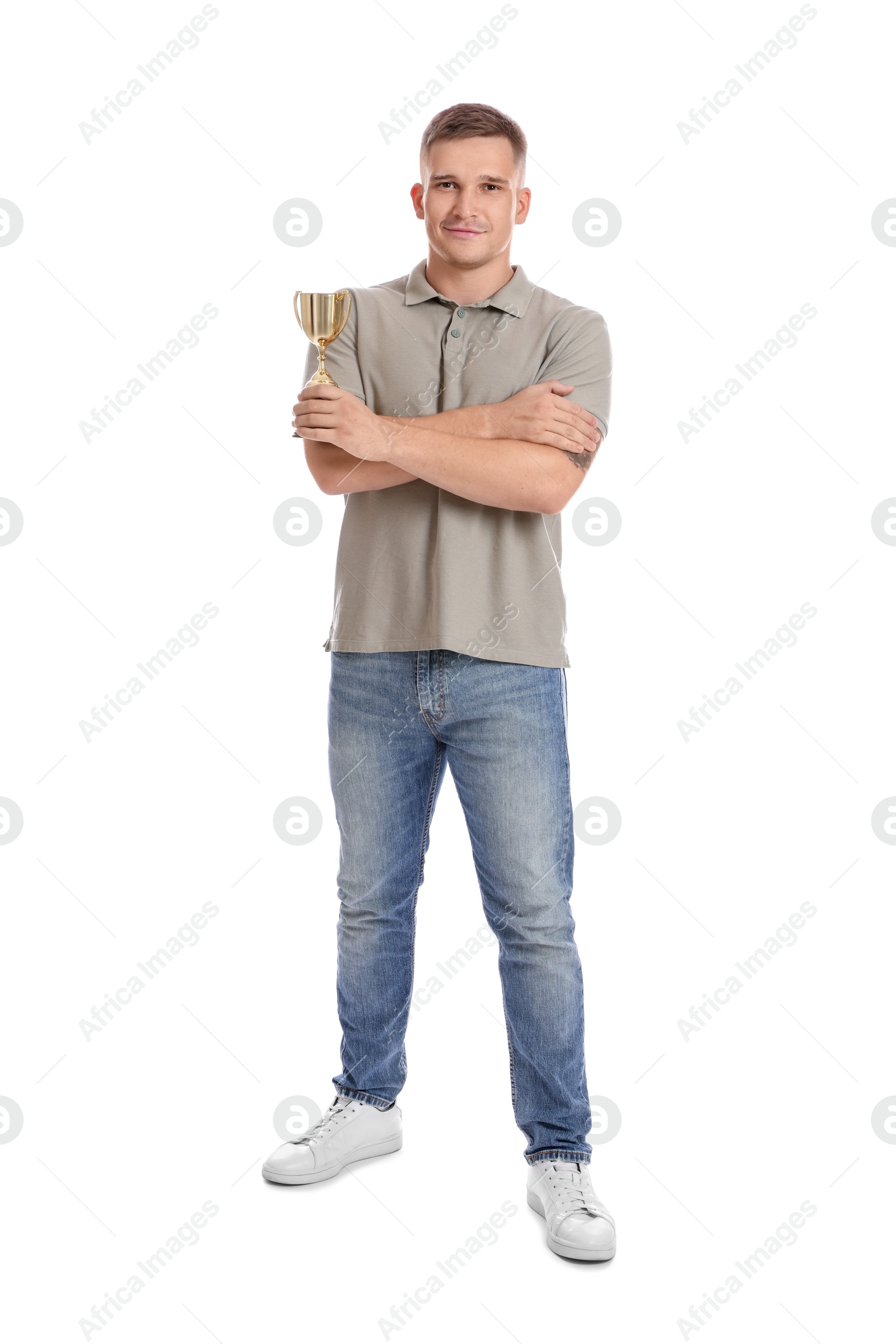 Photo of Happy winner with golden trophy cup on white background