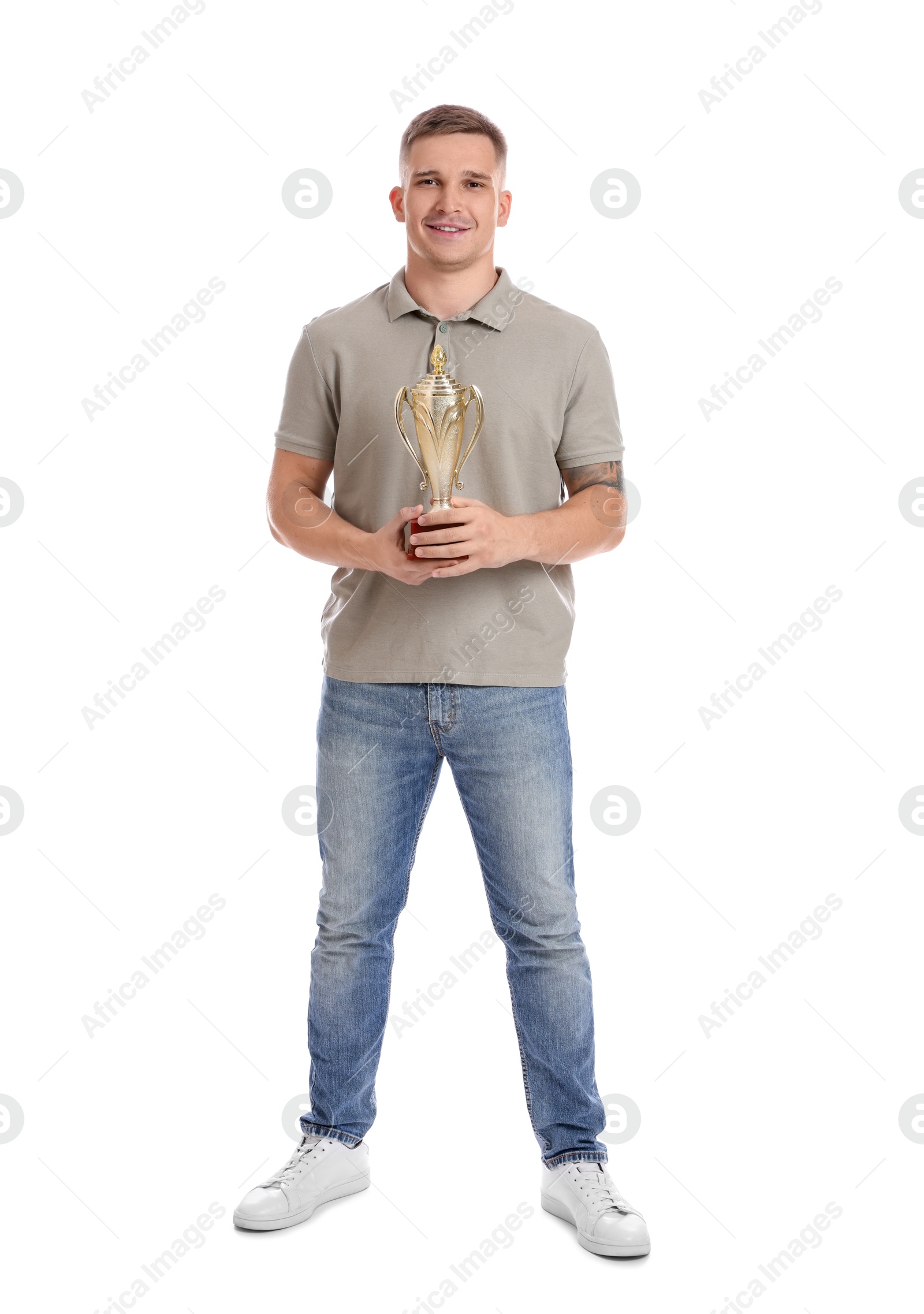 Photo of Happy winner with golden trophy cup on white background