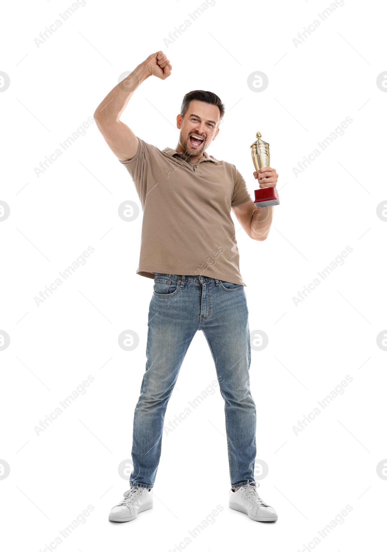 Photo of Happy winner with golden trophy cup on white background