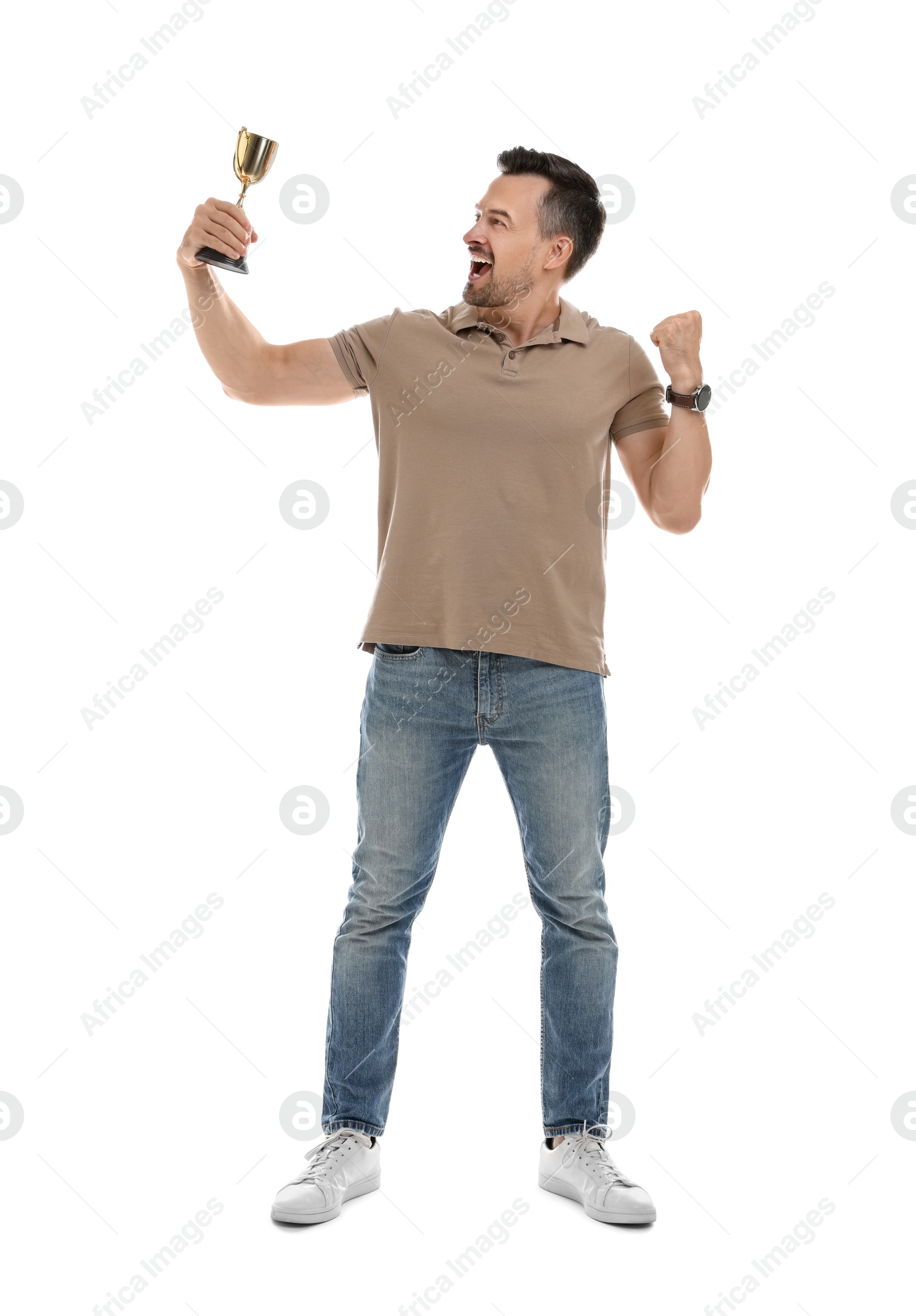 Photo of Happy winner with golden trophy cup on white background