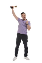 Photo of Happy winner with golden trophy cup on white background