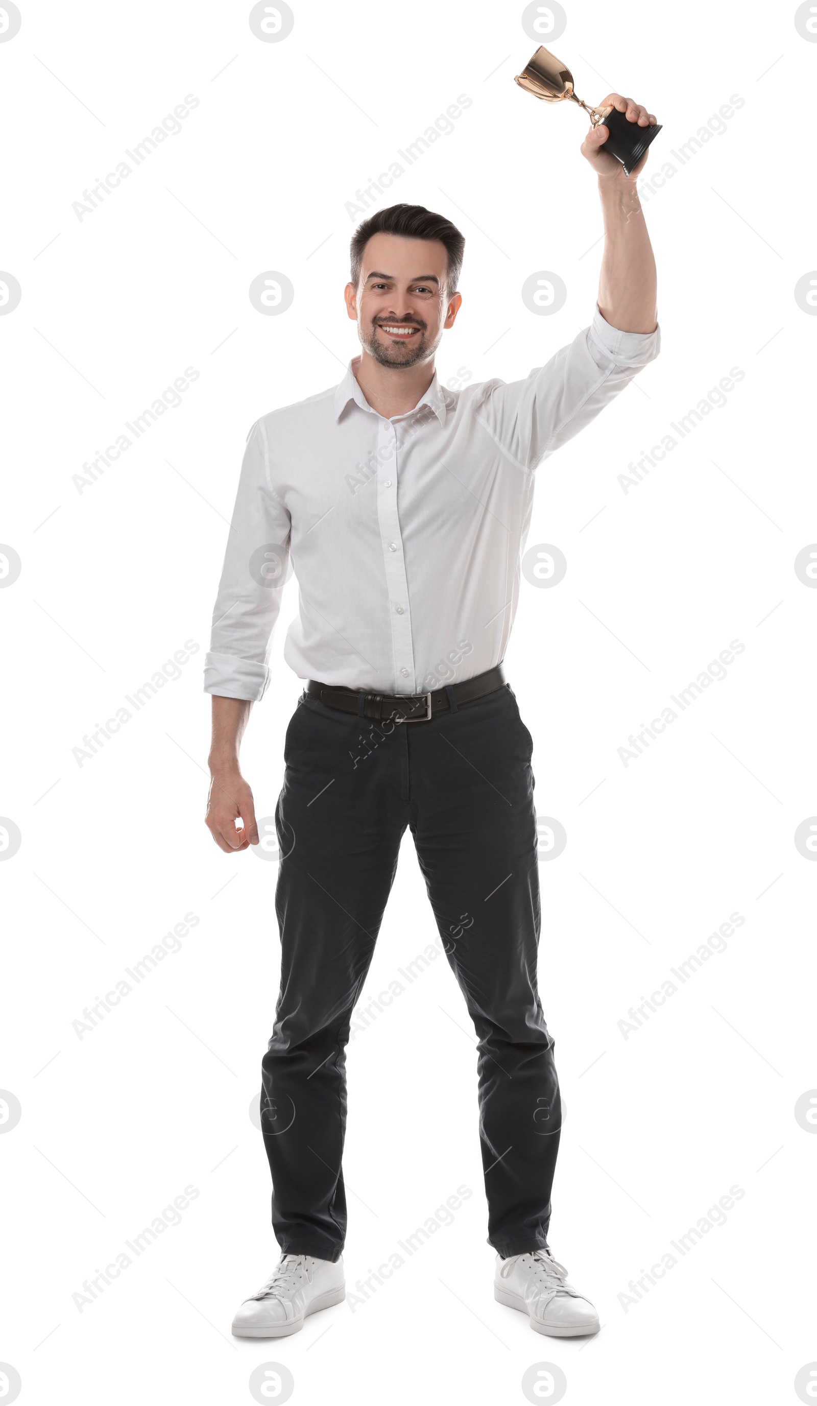 Photo of Happy winner with golden trophy cup on white background