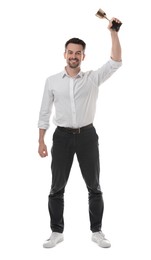 Photo of Happy winner with golden trophy cup on white background