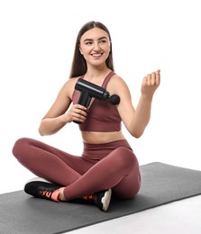 Photo of Woman using percussive massager to relieve bicep on white background