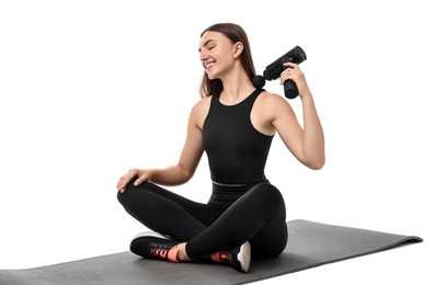 Photo of Woman using percussive massager to relieve trapezius muscle on white background