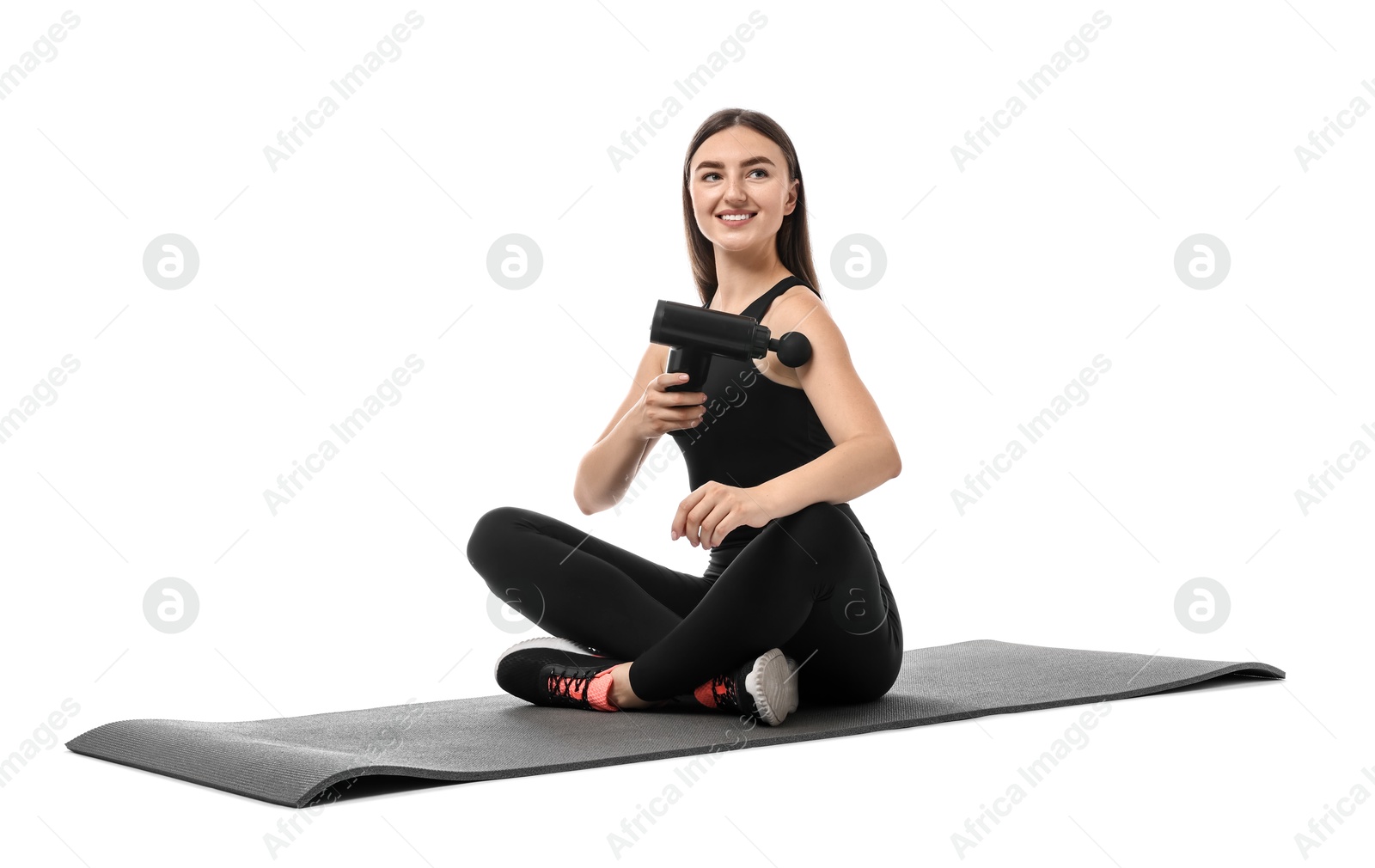 Photo of Woman using percussive massager to relieve arm muscles on white background