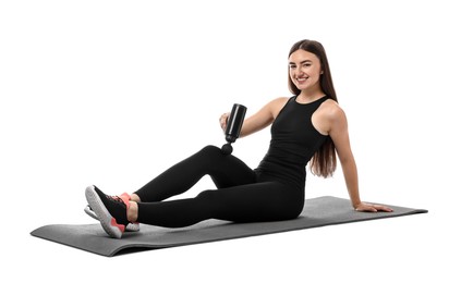 Photo of Woman using percussive massager to relieve thigh muscles on white background