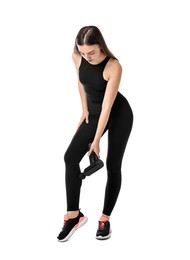 Photo of Woman using percussive massager to relieve leg muscles on white background