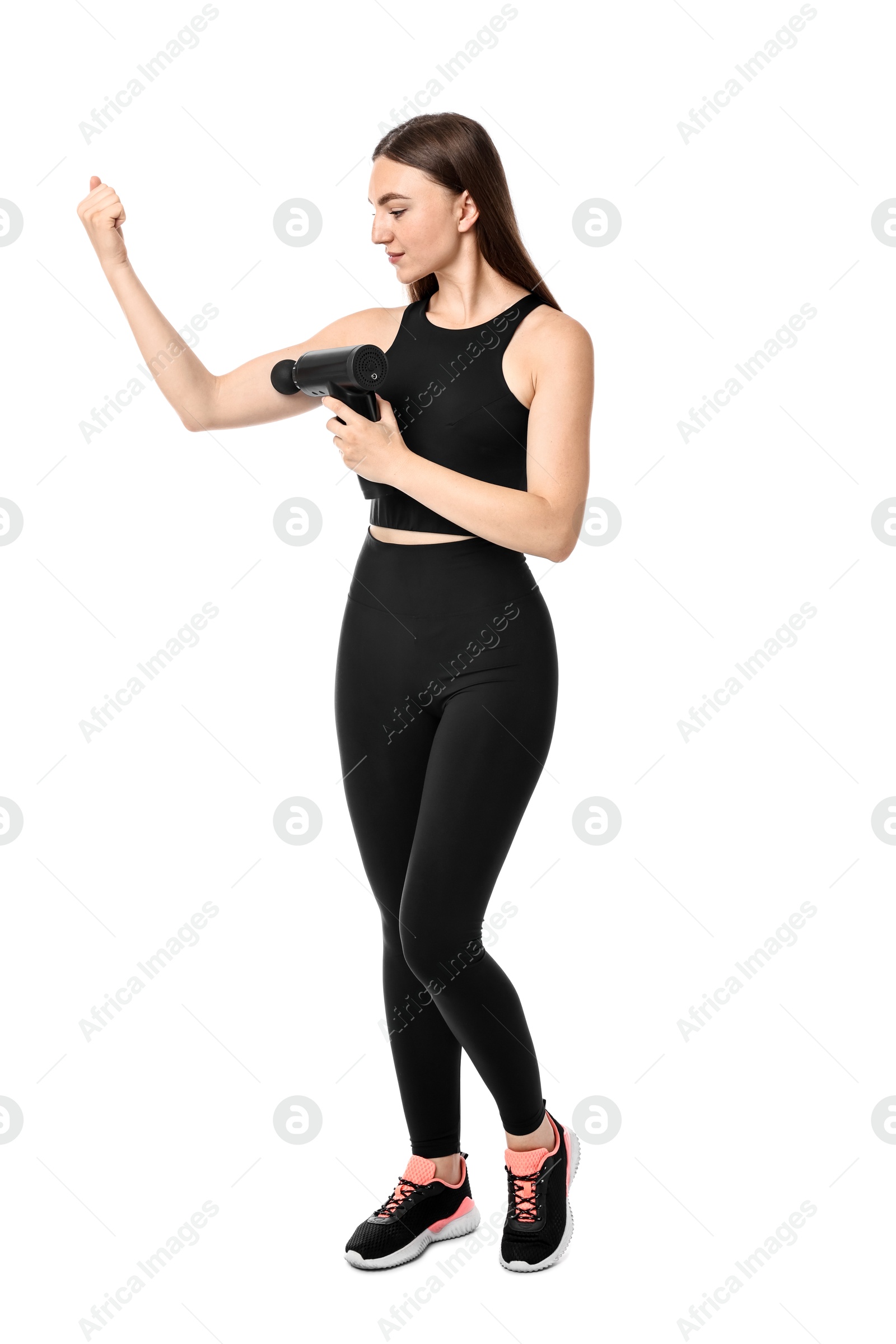 Photo of Woman using percussive massager to relieve bicep on white background