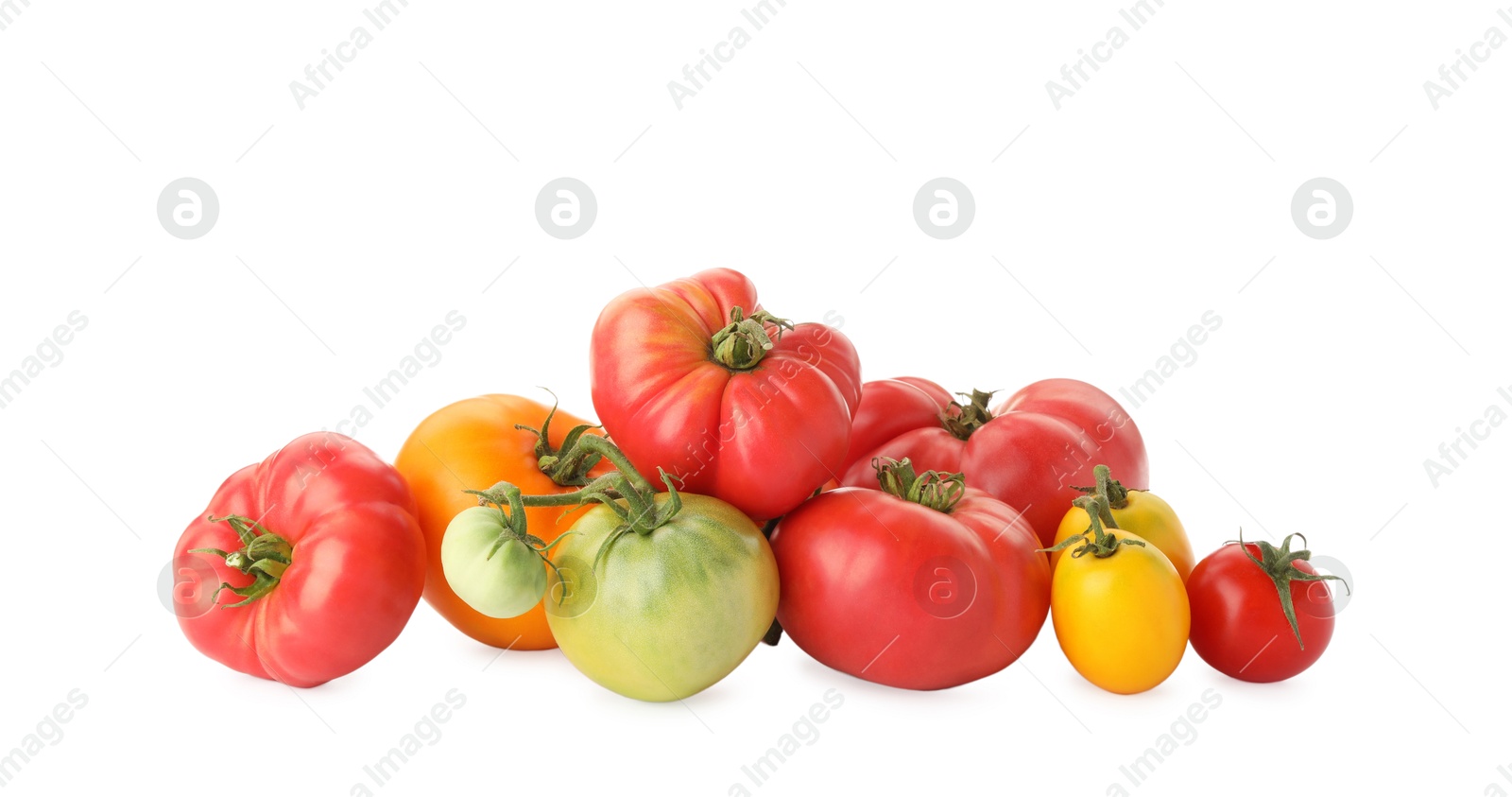 Photo of Different sorts of fresh ripe tomatoes isolated on white