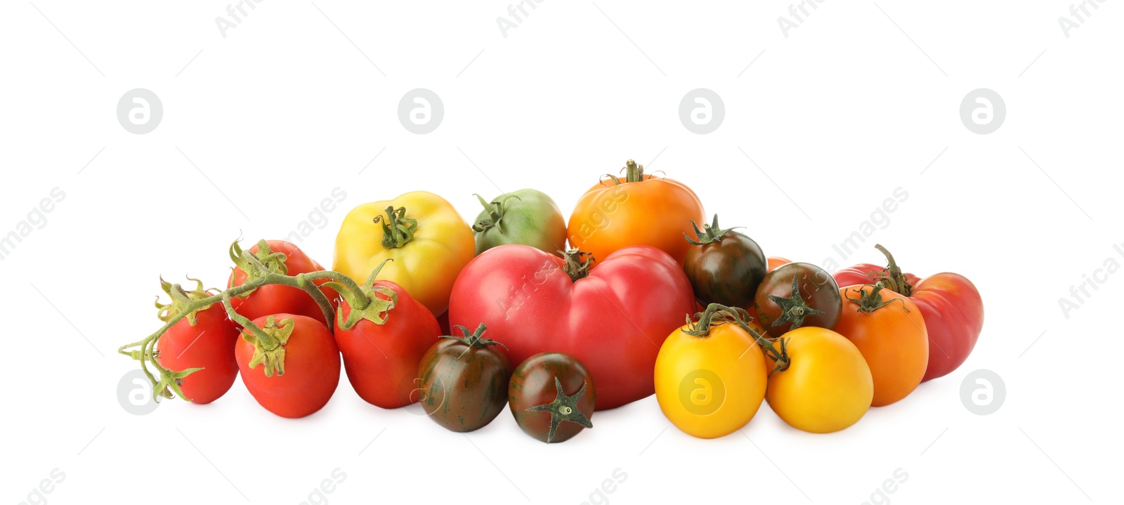 Photo of Different sorts of fresh ripe tomatoes isolated on white