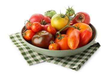 Photo of Different ripe tomatoes in bowl isolated on white