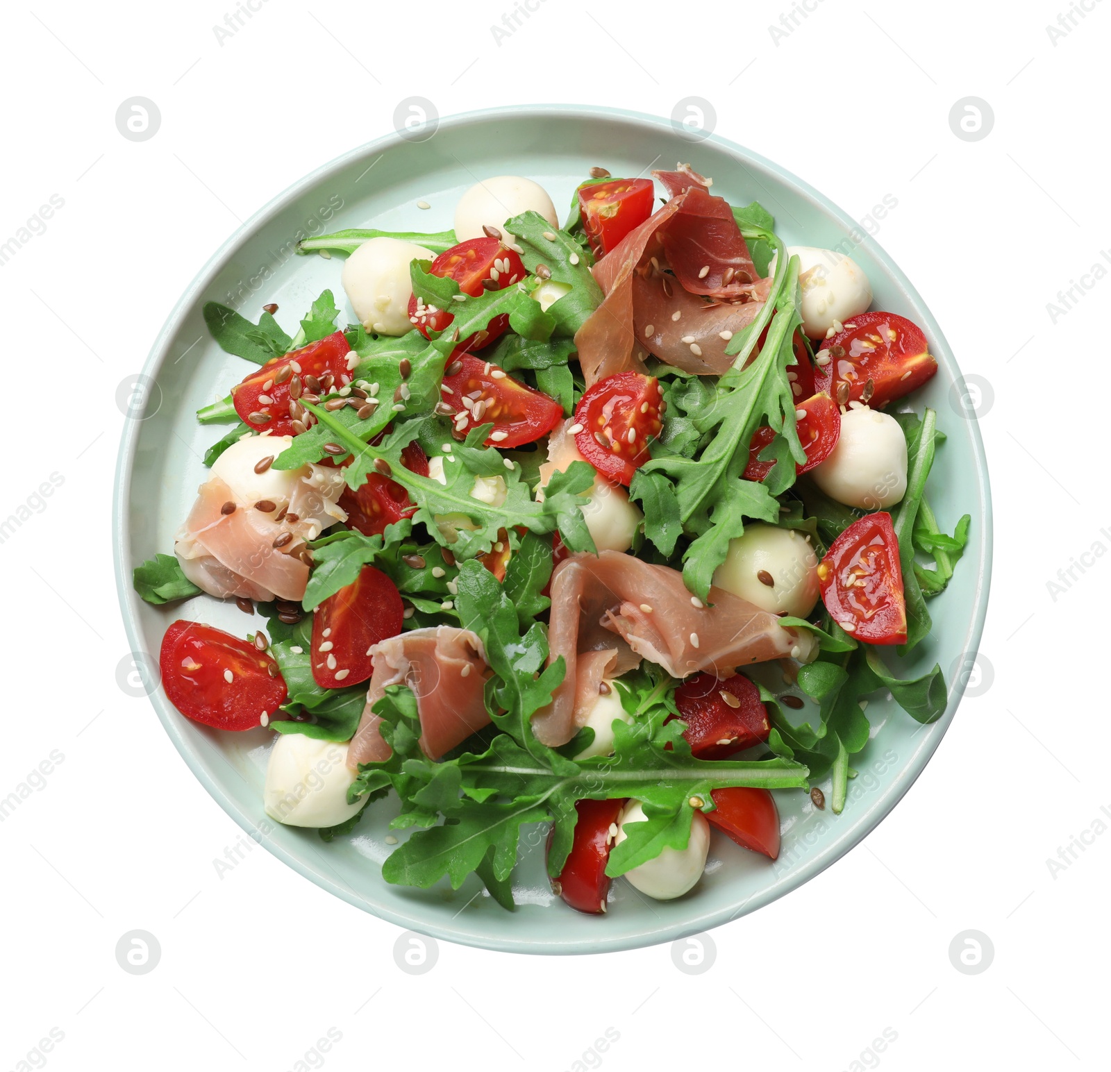 Photo of Tasty salad with arugula, mozzarella cheese, tomatoes and jamon isolated on white, top view