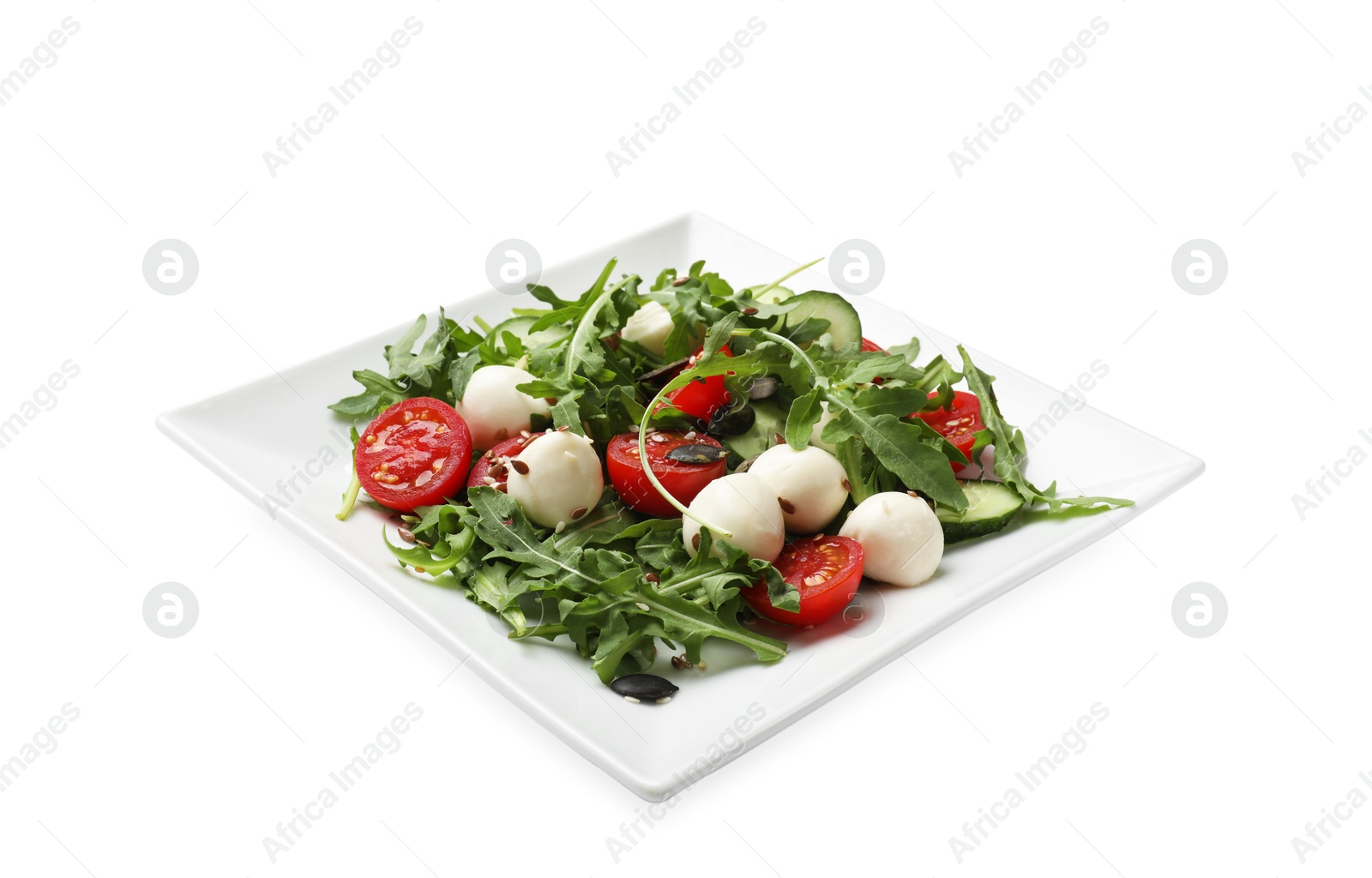 Photo of Tasty salad with arugula, mozzarella cheese and vegetables isolated on white