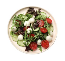 Photo of Tasty salad with arugula, lettuce, mozzarella cheese and vegetables isolated on white, top view