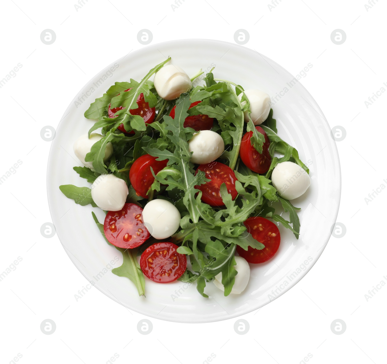 Photo of Tasty salad with arugula, spinach, mozzarella cheese and tomatoes isolated on white, top view