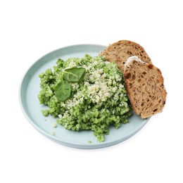 Photo of Tasty spinach risotto and bread isolated on white