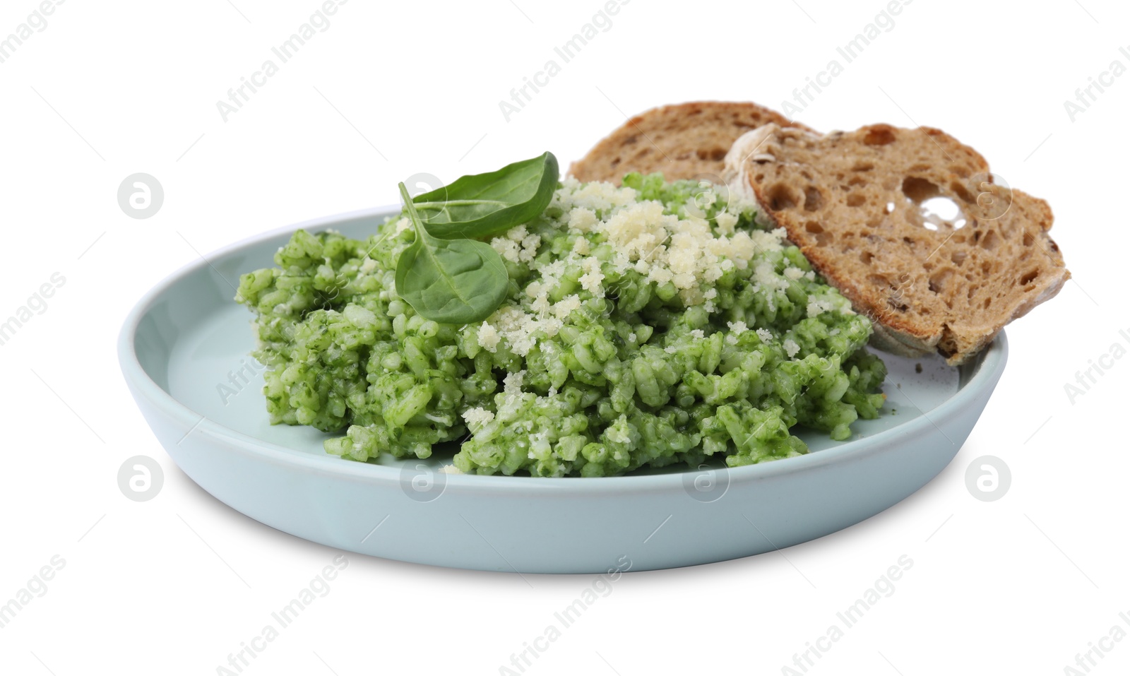 Photo of Tasty spinach risotto and bread isolated on white