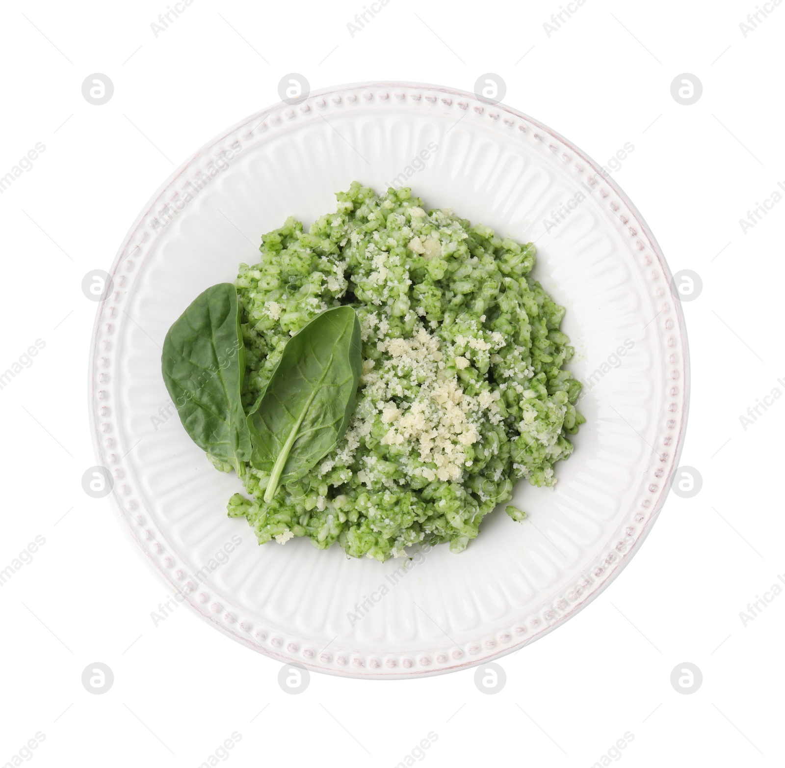 Photo of Tasty spinach risotto isolated on white, top view