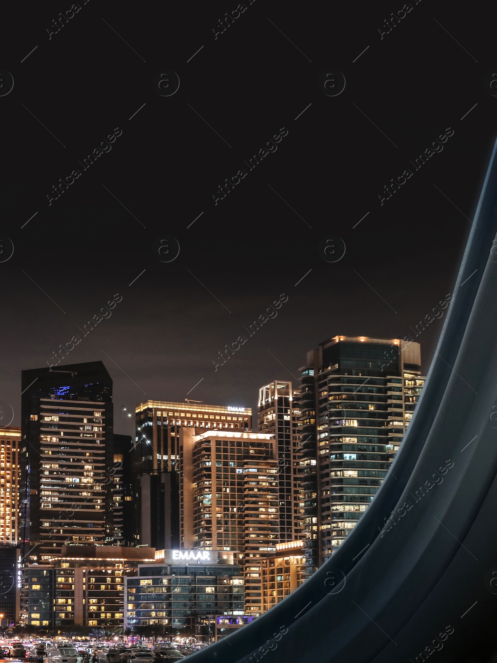 Image of Airplane taking off or landing, view on night city from window