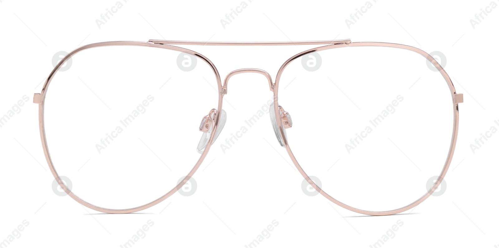 Image of Glasses with golden frame isolated on white