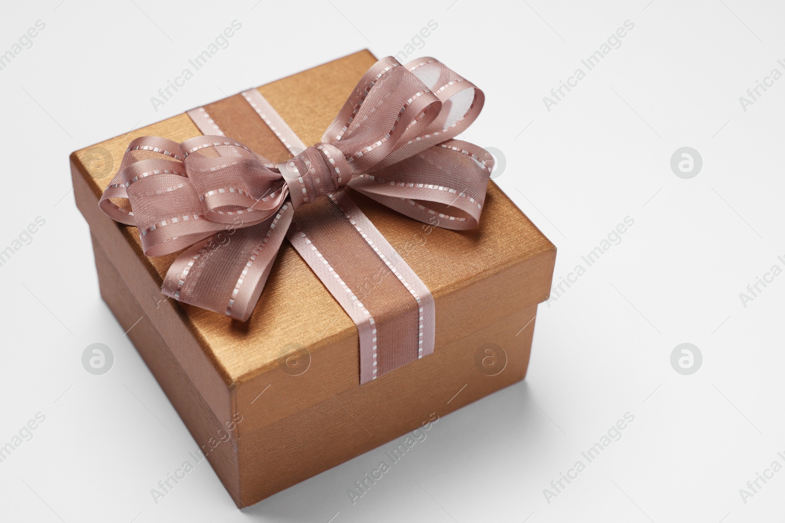 Photo of Gift box with bow on light grey background