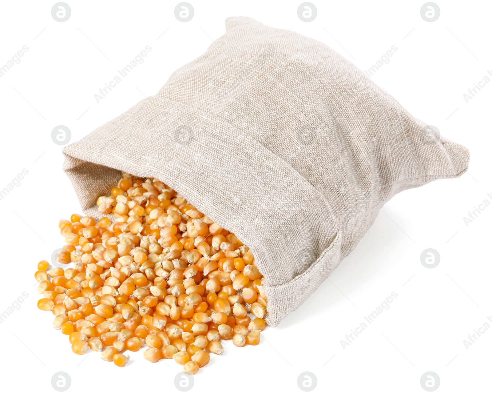 Photo of Fresh corn kernels and overturned burlap sack isolated on white