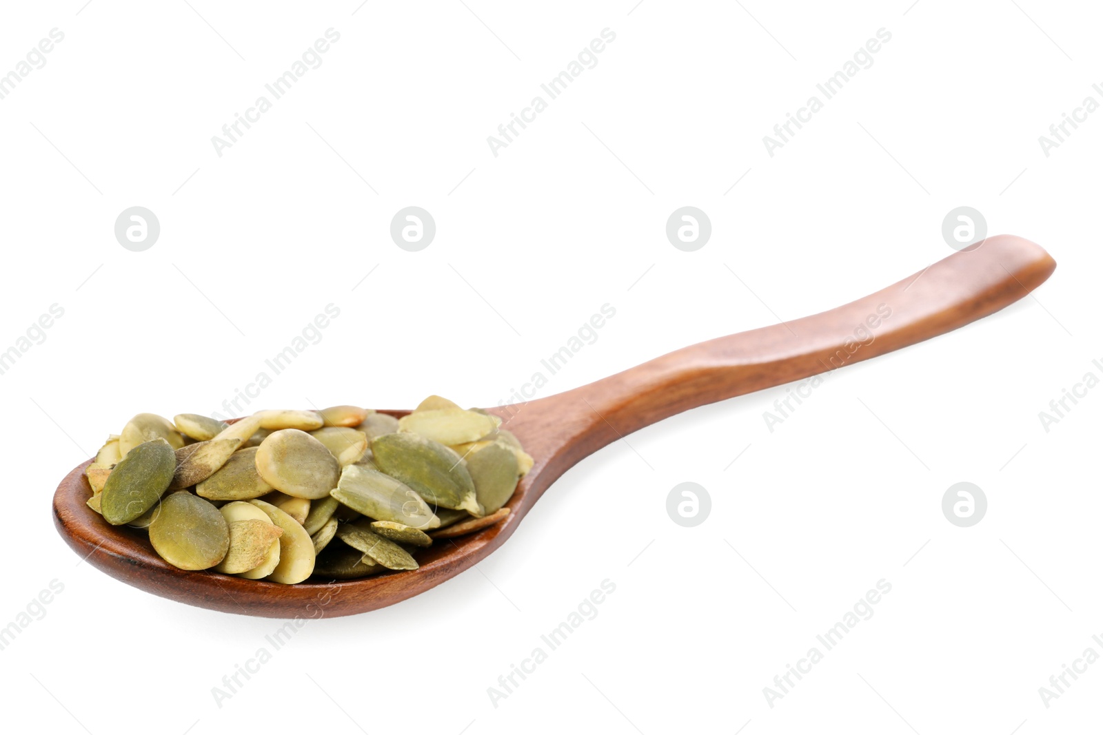 Photo of Peeled pumpkin seeds in wooden spoon isolated on white