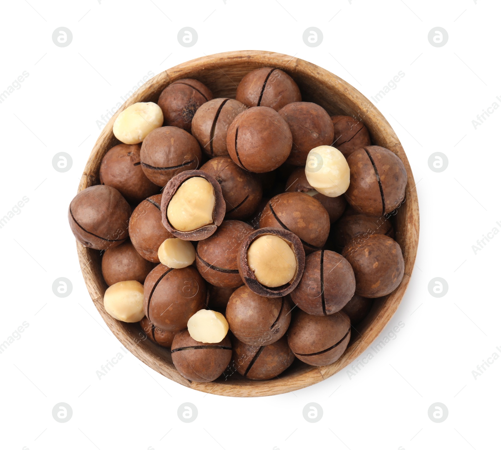 Photo of Macadamia nuts in bowl isolated on white, top view