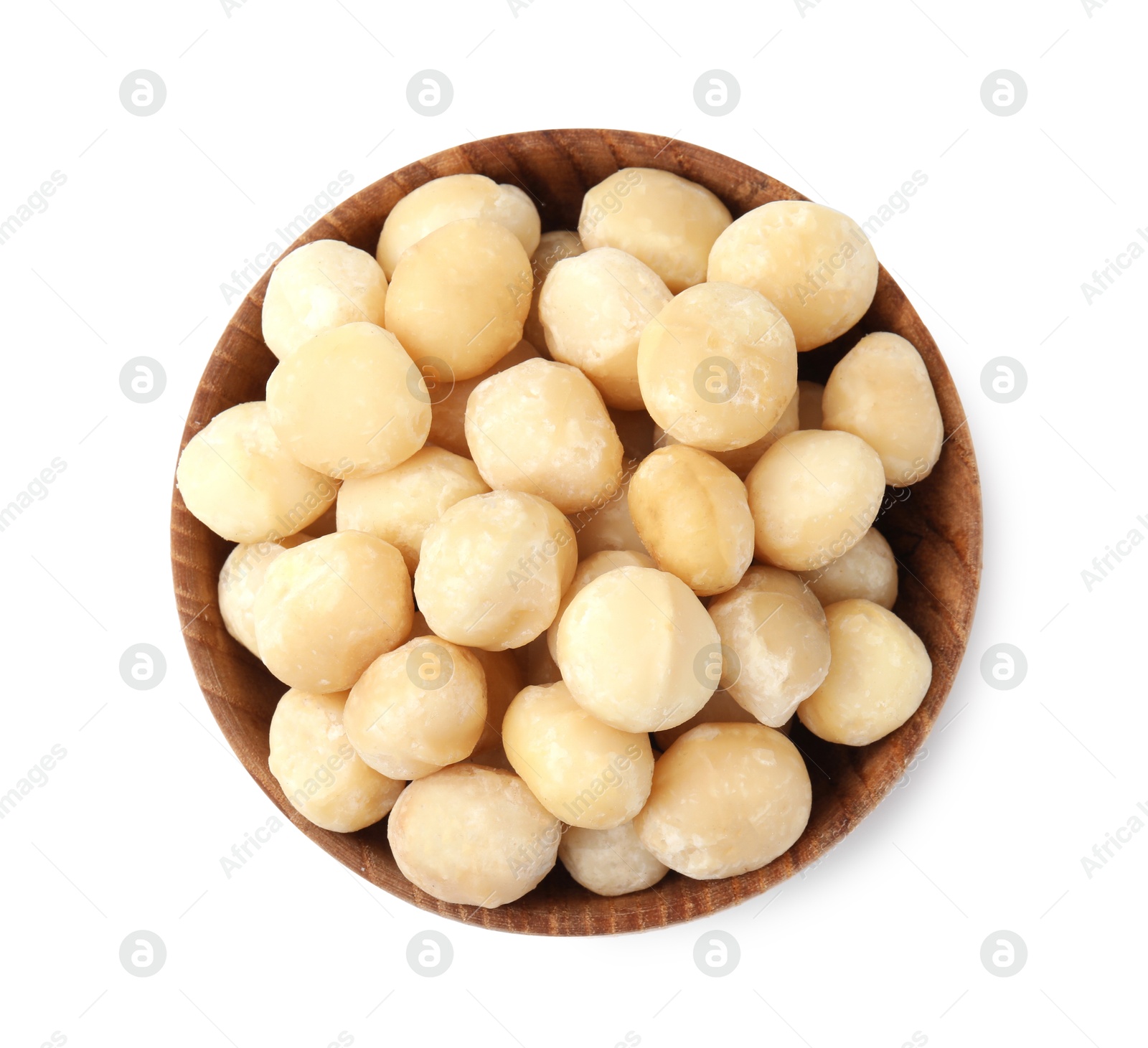 Photo of Macadamia nuts in bowl isolated on white, top view