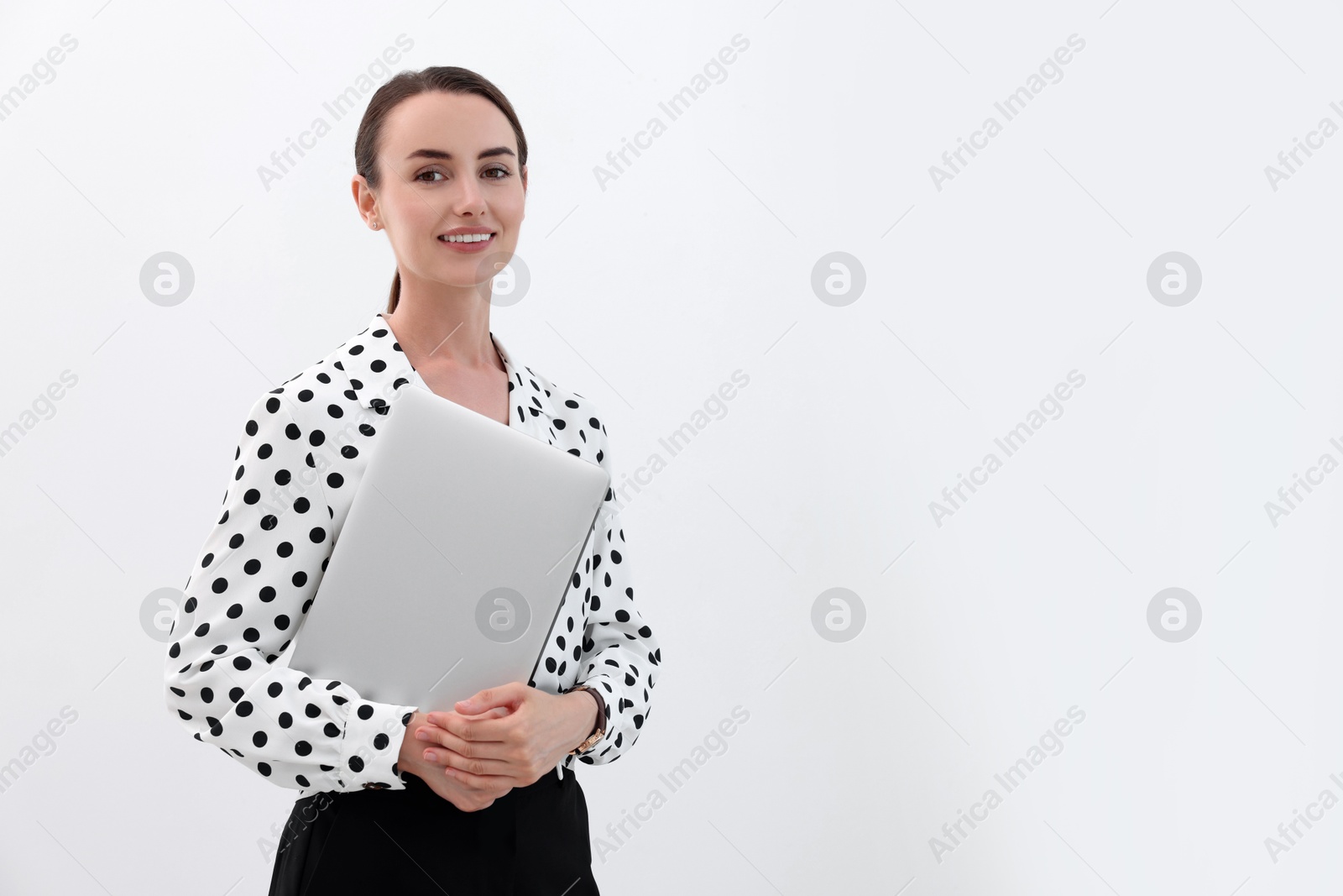 Photo of Portrait of smiling businesswoman with laptop on white background. Space for text