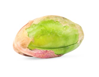 Photo of One peeled pistachio nut isolated on white