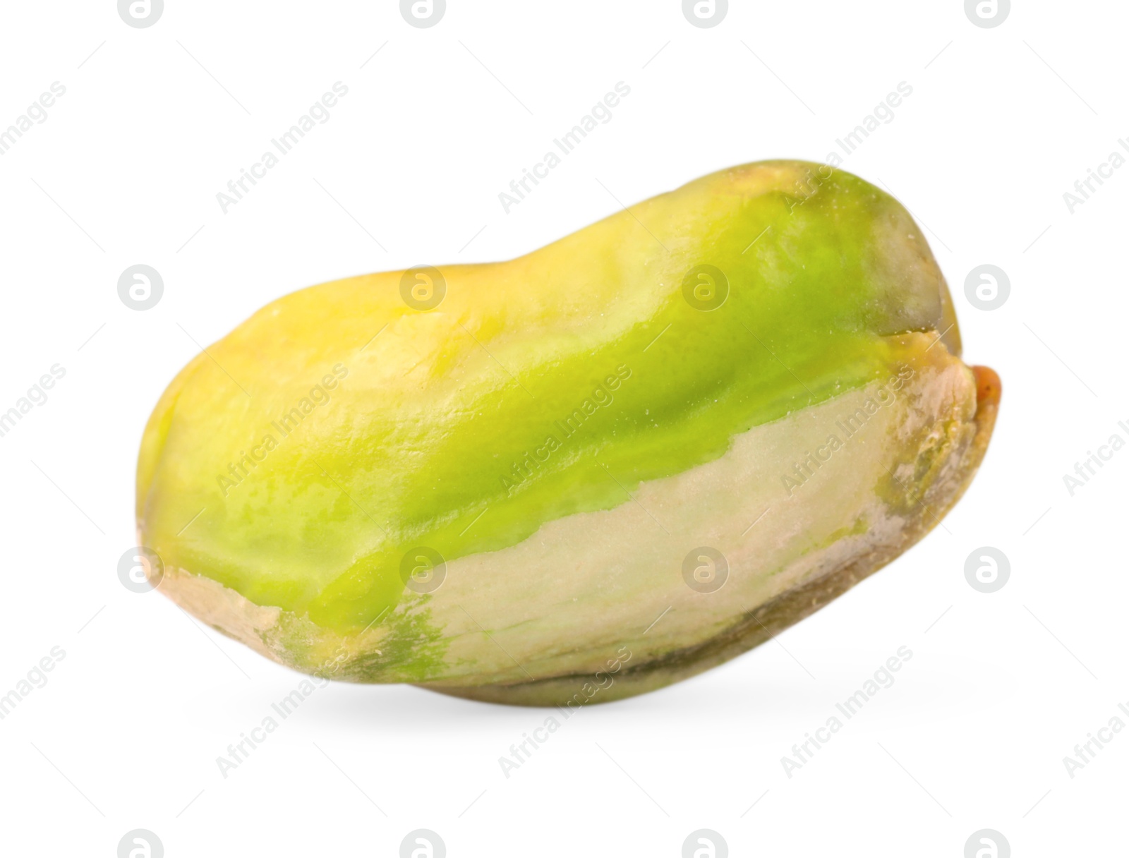 Photo of One peeled pistachio nut isolated on white