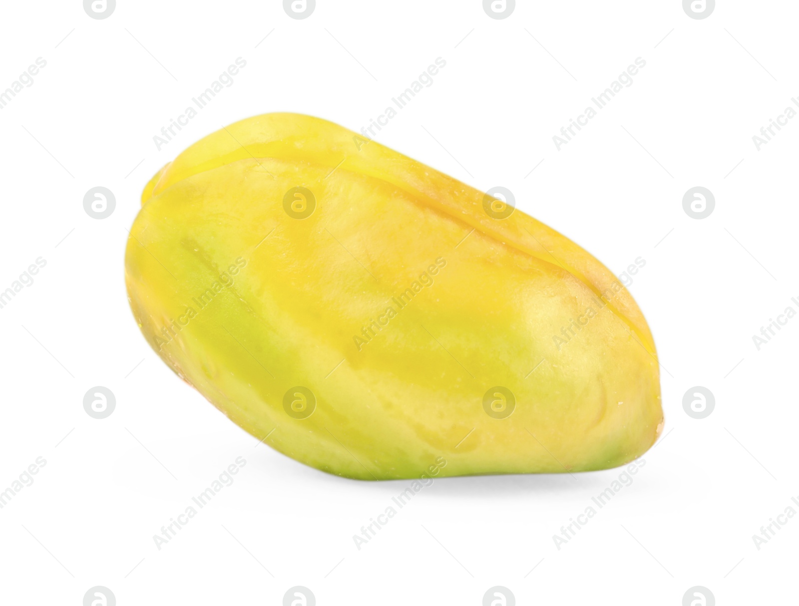 Photo of One peeled pistachio nut isolated on white