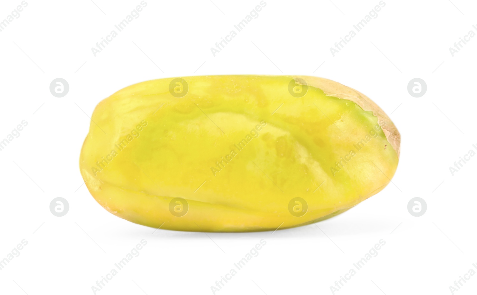 Photo of One peeled pistachio nut isolated on white