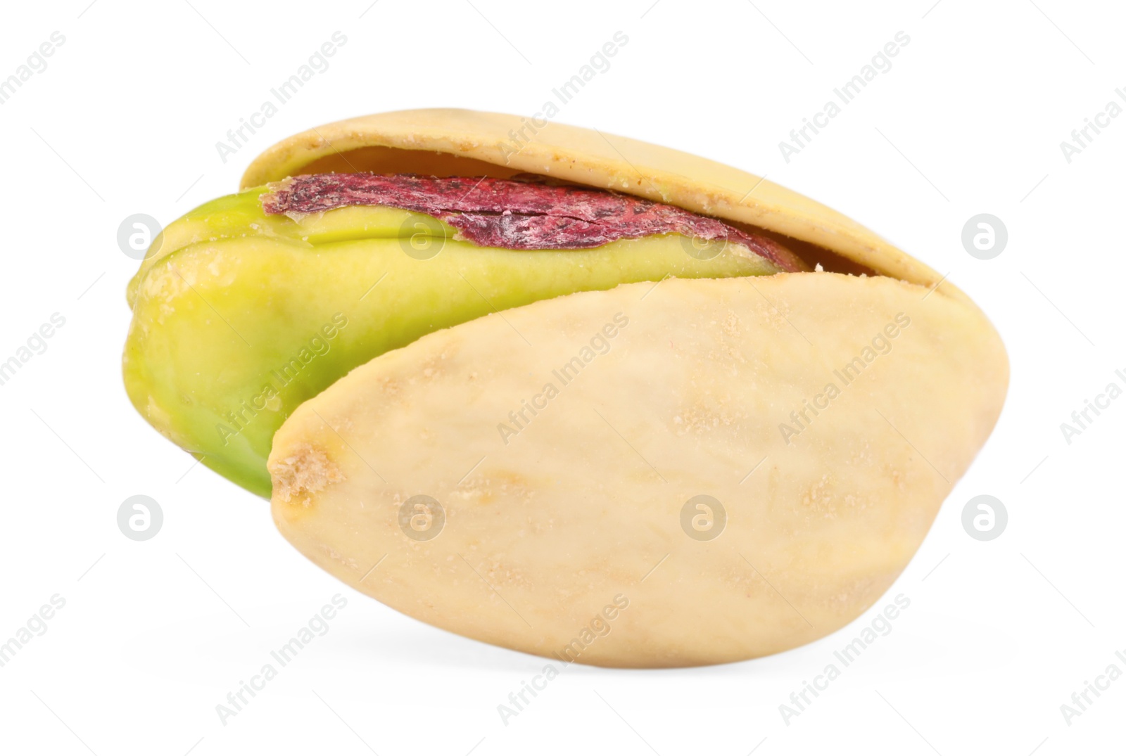 Photo of One tasty pistachio nut isolated on white