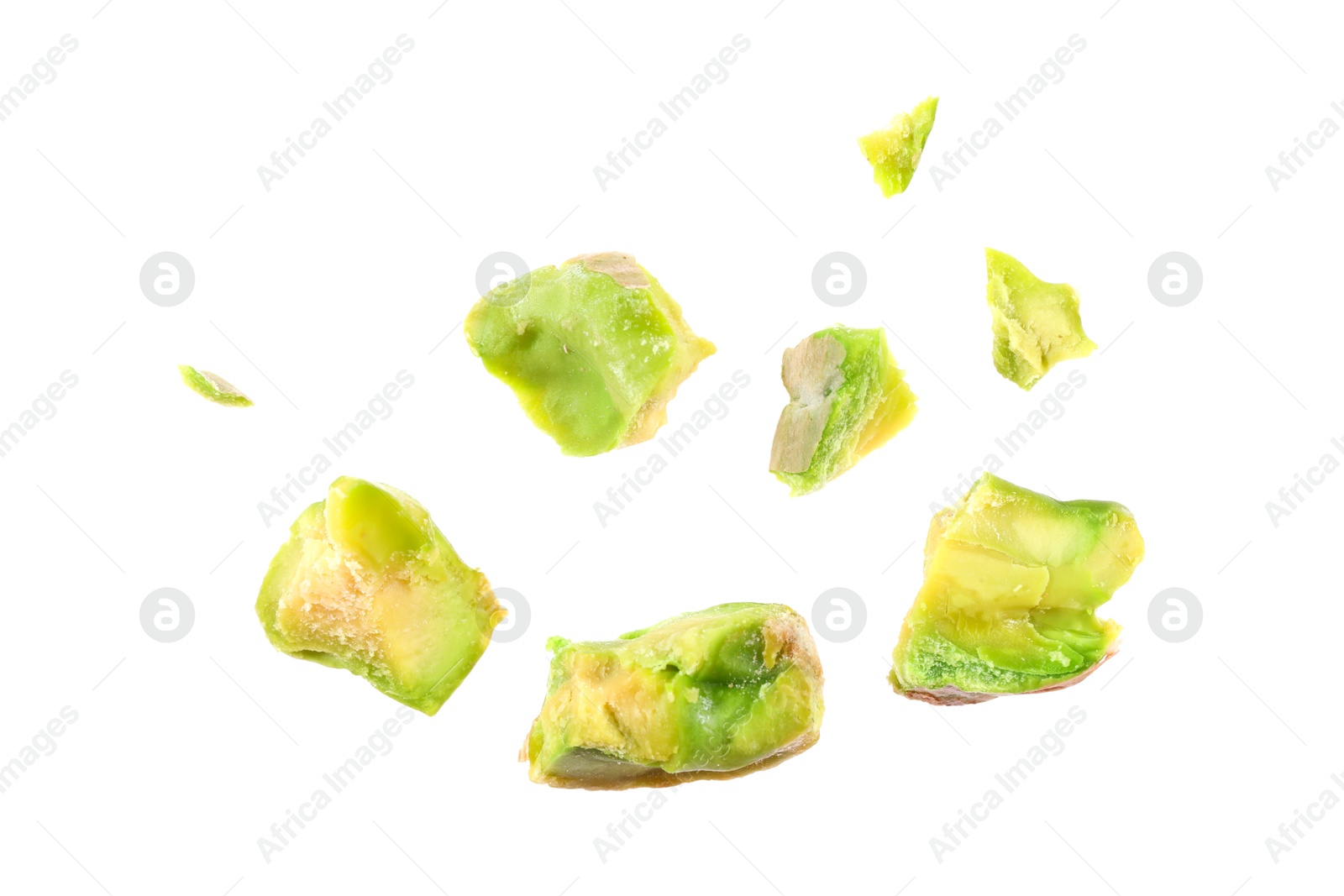 Photo of Pieces of peeled pistachio nut isolated on white