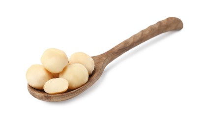 Spoon with macadamia nuts isolated on white