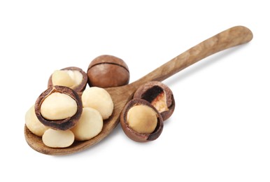 Photo of Spoon with macadamia nuts isolated on white