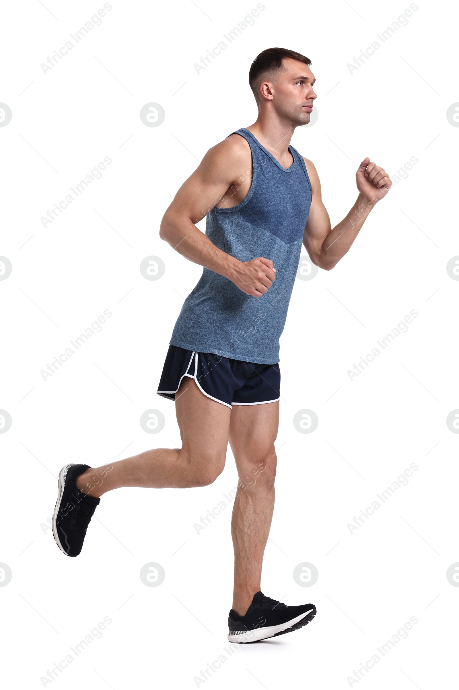 Photo of Man in sportswear running on white background