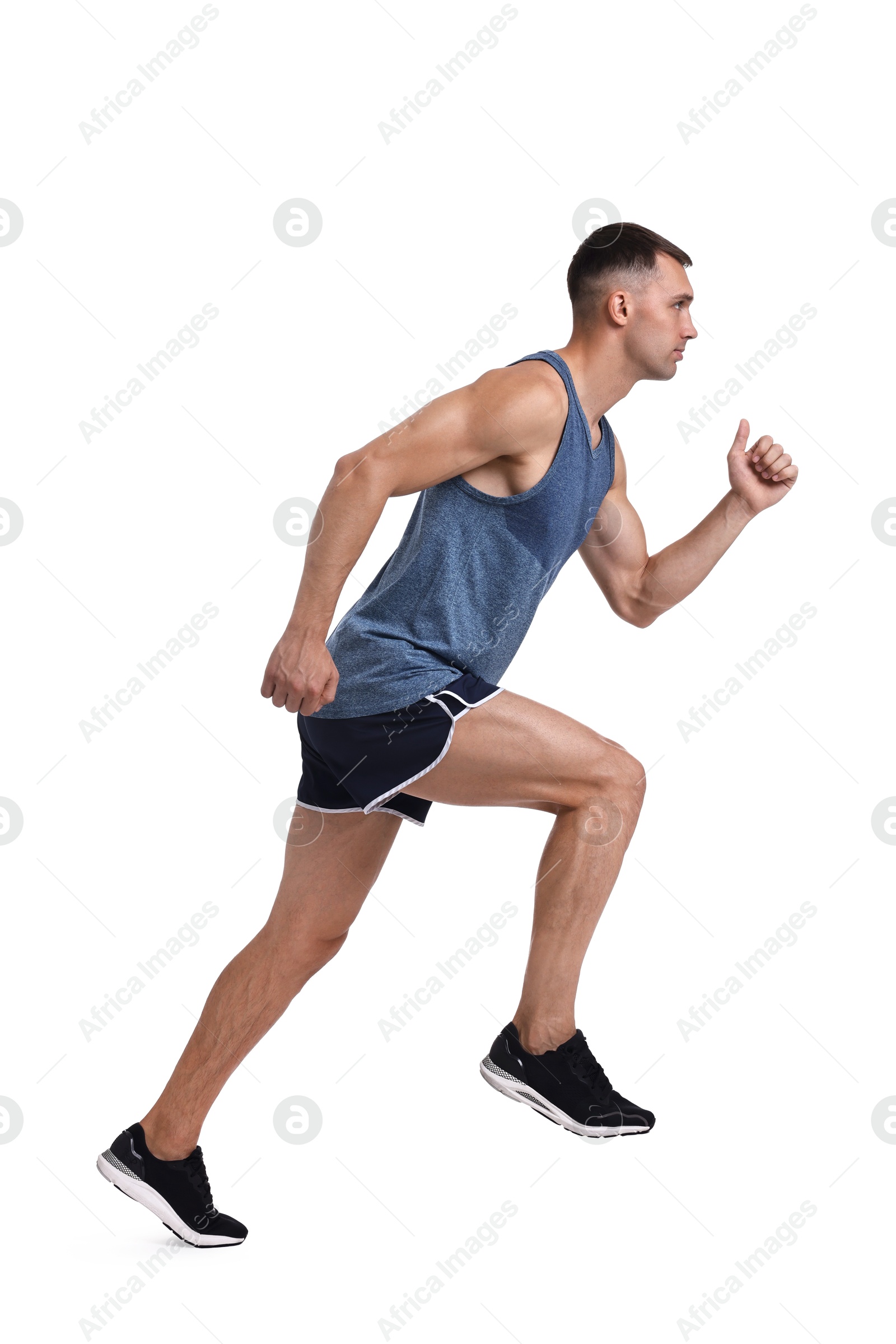 Photo of Man in sportswear running on white background