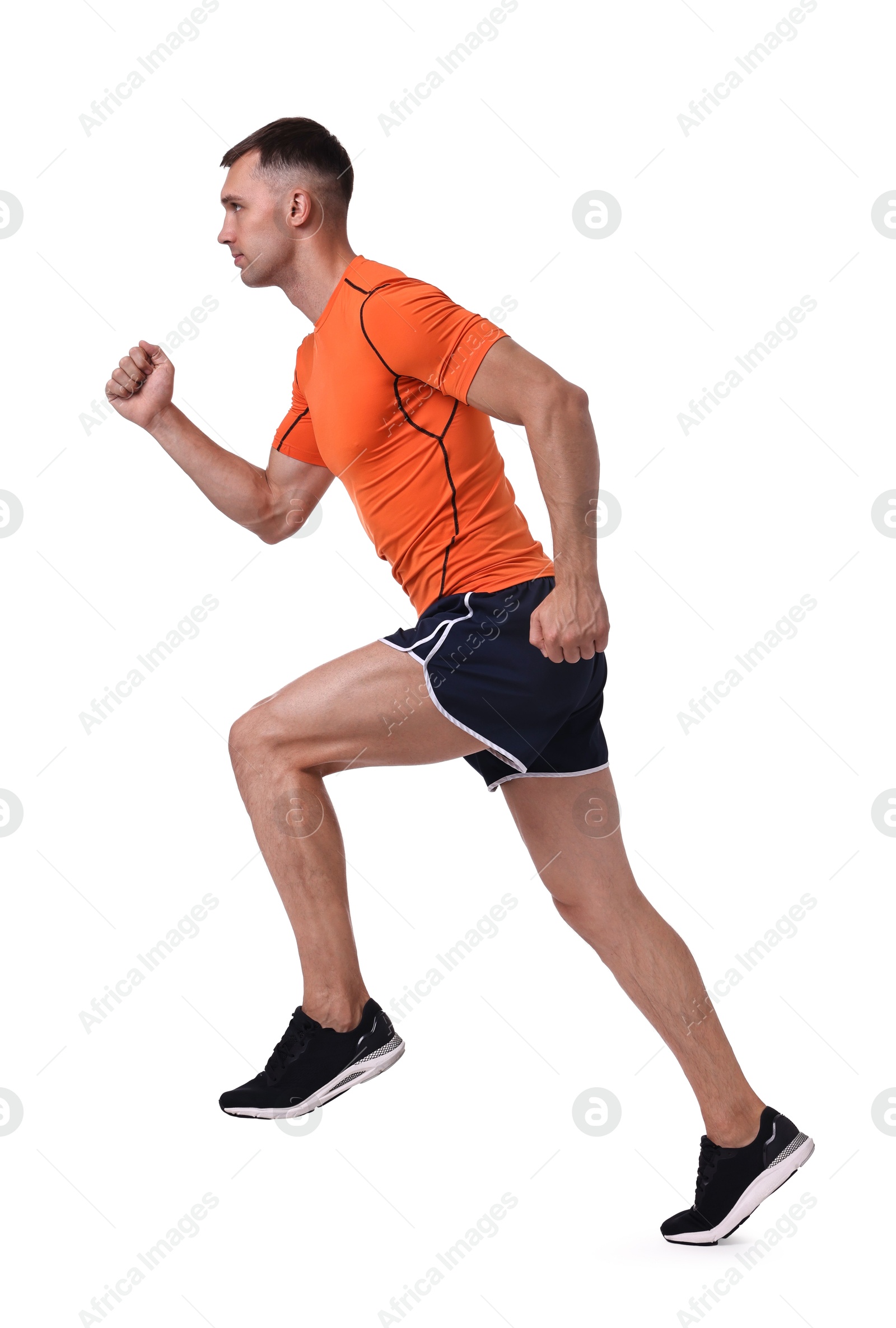 Photo of Man in sportswear running on white background