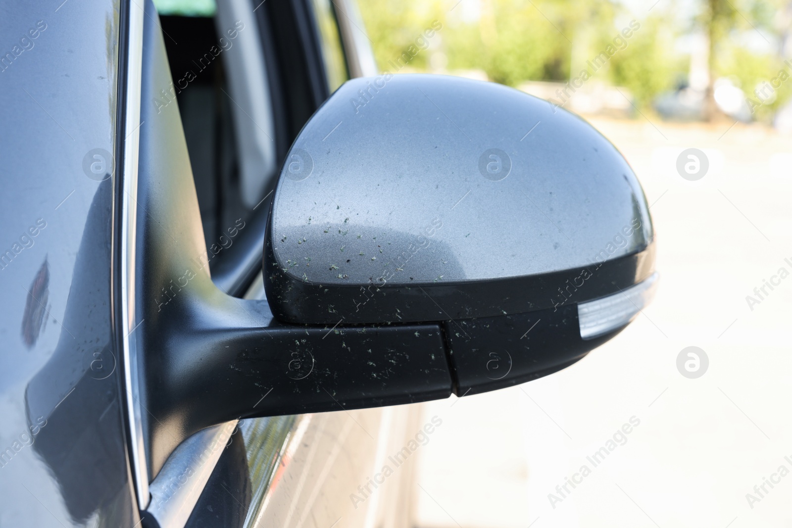 Photo of Modern auto with dirty stains, closeup view