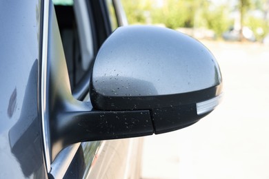 Photo of Modern auto with dirty stains, closeup view