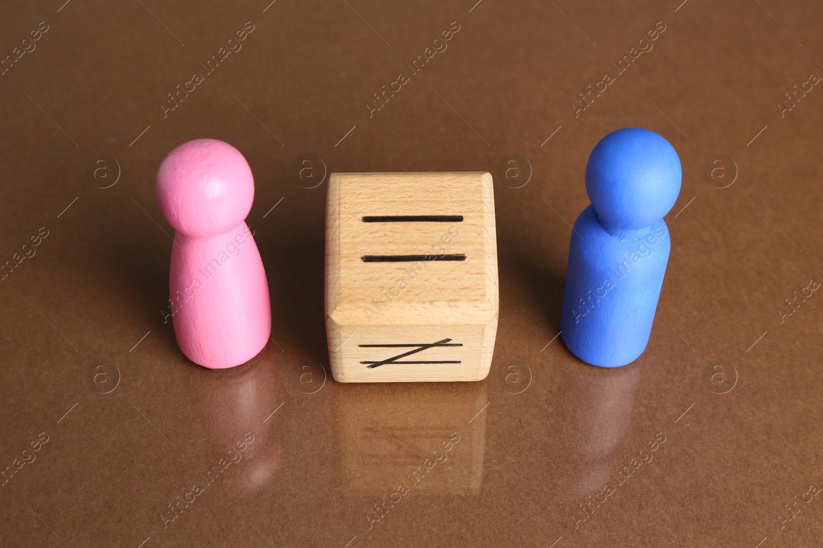 Photo of Gender equality concept. Male and female figures on brown background