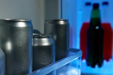 Many different cold drinks in refrigerator, closeup